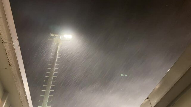 Sheets Of Heavy Rain Fly In Powerful Winds As Hurricane Hits City At Night - Saola