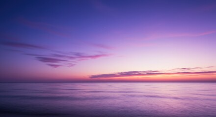 Obraz premium Purple Sky and Ocean at Sunset (Photo)