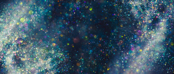 Sparkling blue and silver dust glittering and swirling around a center space with a dreamy or...