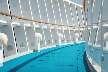 White with blue deck of cruise ship