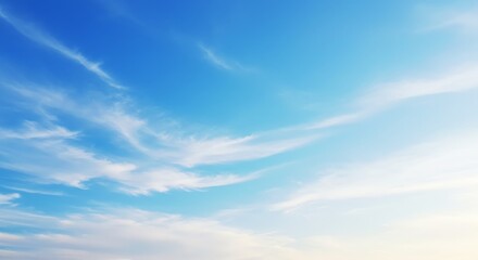 Fototapeta premium Serene Blue Sky: Wispy Clouds in a Peaceful Landscape