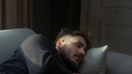 Young Man Suffering from Neck and Back Pain After Sleeping in an Uncomfortable Position