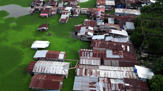 Houses on the water, flooding in the Peruvian Amazon, in the city of Iquitos, where the Nanay River rises and floods the houses on the riverbanks.