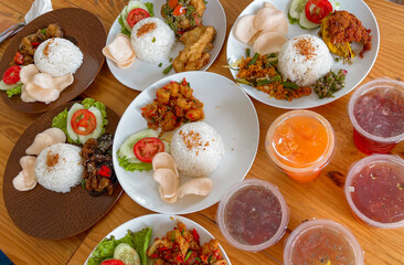 Ayam Geprek or Chicken crush Indonesian food Crispy fried chicken with hot and spicy chili sauce Sambal Sauce Served delicious recipe