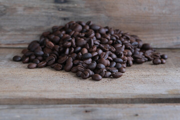 Coffee beans on a wooden background