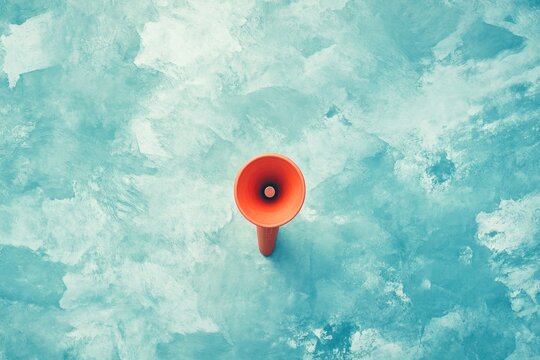 Minimalist megaphone design on soft blue background, coral megaphone emphasized in center, sleek horizontal layout