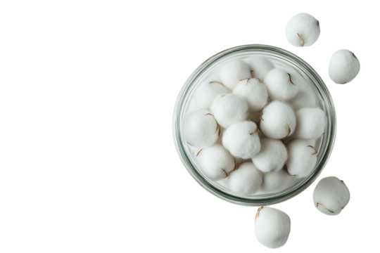 Fluffy cotton balls in a glass jar on a black background a serene and minimalist still life on transparent background