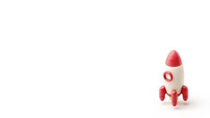 Red toy launching rocket on white background. Empty text space.