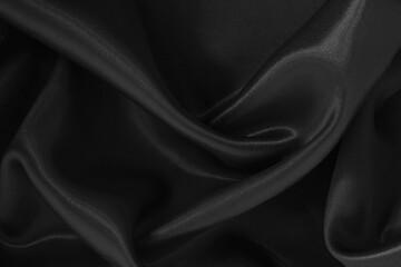 Black fabric texture for background and design, beautiful pattern of silk or linen.