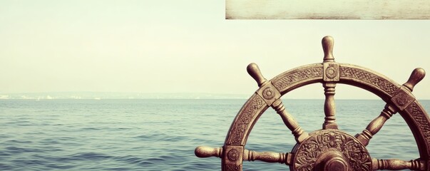 A detailed antique wooden ship wheel against a vast ocean view