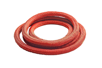Close-up image of a coiled, bright red flexible cord.  Its texture and design are clearly visible against a dark background.