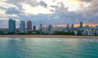 Naklejka premium Miami Beach aerial view with skyline. Miami from above. Miamis famous landmarks. South Pointe beach with skyscrapers. Miami city panorama. Miami skyline and ocean. South Florida.