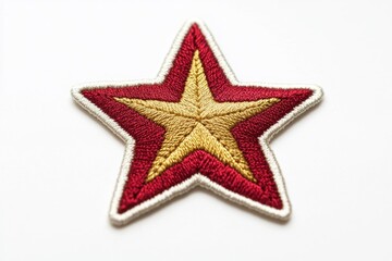 Obraz premium Embroidered red and gold star patch