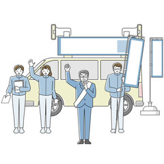 選挙カーの前で街頭演説をする男性候補者