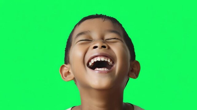 Pure Joy: A child radiates infectious joy, laughter, and pure, unrestrained happiness, presenting an ideal image for evoking positive emotions and themes of childhood.