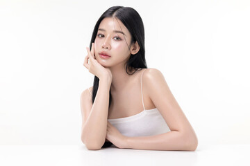 Glowing skin make up style of beautiful young Asian model isolated on white background.