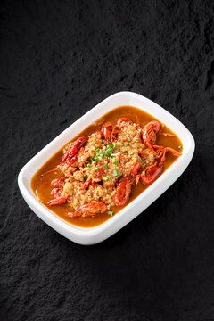Professional Chinese food photography, crayfish on a rock textured table