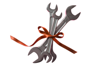 Wrenches tied with a ribbon represent Labor Day and its significance, isolated on white, PNG