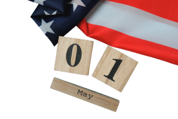 Wooden blocks show May 1 with an American flag for Labor Day, isolated on white, PNG