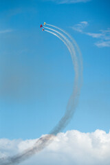 Bi Planes performing stunts in the air