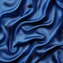 Fototapeta premium Deep blue satin fabric texture. Luxurious, smooth folds