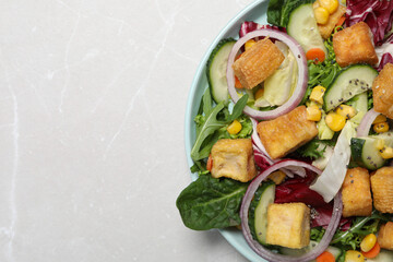 Fried tofu salad in a bowl close-up