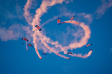 Parachute team performing an stunt