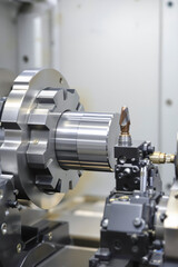 close-up view of a cnc lathe precisely machining a metallic workpiece
