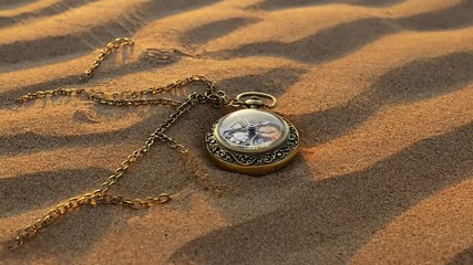 Antique pocket watch rests on desert sand, its chain trailing - Powered by Adobe