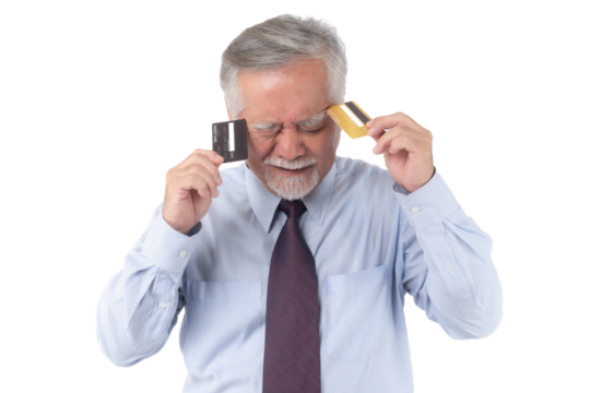 Senior man with grey hair looking stressed while holding two credit cards to his temples, representing financial stress, credit card finance issues, money management problems , transparent background