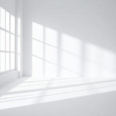 Obraz premium A bright, airy white room featuring large windows that allow warm sunlight to stream in, illuminating the space and creating a serene atmosphere.