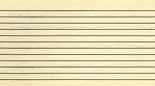 the image showcases a full shot of a writing surface commonly used for note taking. parallel lines span horizontally across the page, dividing it into equal sections