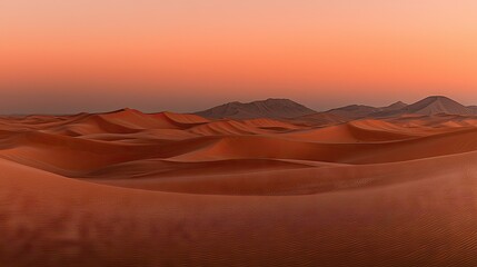 Naklejka premium Beautiful scenic desert landscape with rolling sand dunes and mountains