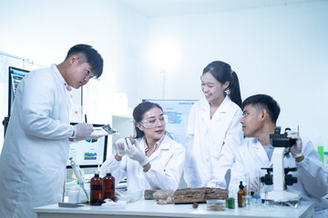 Fototapeta premium In the laboratory, scientists conduct experiments on geological samples, using analysis and research to study the Earth's composition and deepen our understanding of geological science.
