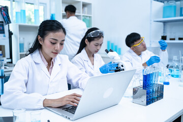 In the laboratory, several researchers and scientists, each focused on their own biology experiments, conduct detailed analysis to advance the field of science and deepen understanding.