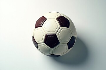 Overhead view of football on white background, spiral, brown