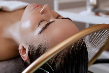 Printed roller blinds Close-up of a woman receiving a head massage during a Japanese head spa treatment with water flowing from a special hair washing tool, focusing on the scalp relaxation and beauty therapy