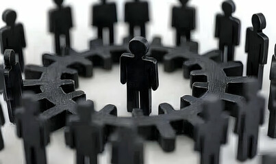 Silhouetted figurines encircle a central gear, symbolizing teamwork, unity, and connection