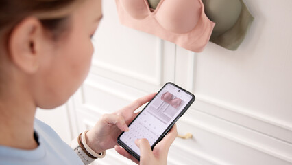 Young adult woman asia people take photo old clean used undies bra second hand sell. Go green happy home eco care reduce zero waste fabric issue donate buy sale online app reuse side hustle bank store