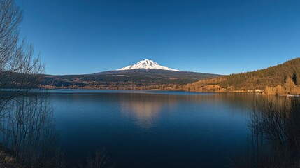 Majestic mountain reflecting on tranquil lake