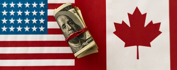 Canadian flag with american dollar bills