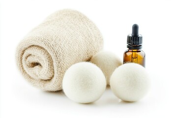 Set of wool dryer balls with a drop of essential oil, isolated on white background