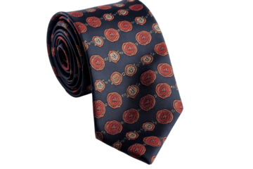 Close-up view of a rolled, navy blue necktie adorned with a repeating pattern of red flowers on a dark background.