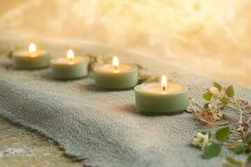 柔らかな灯りとハーブが織りなす、癒しのアロマキャンドルが香るリラックス空間のイメージ