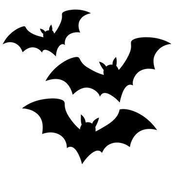 Black silhouettes of bats flying vector as a Halloween or spooky decoration