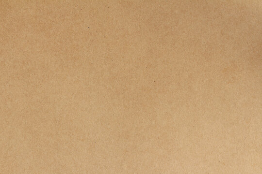 Cardboard sheet texture background, pattern of brown kraft paper with vintage style.