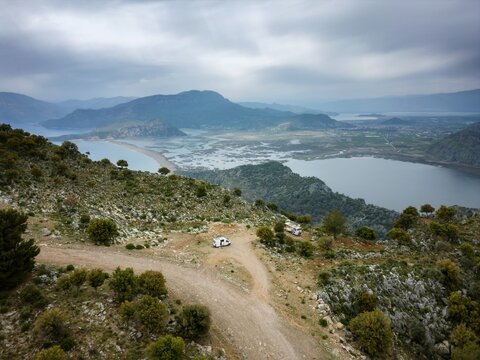 Camper van enjoying panoramic view of dalyan beach bay in Turkey