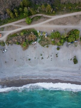 Aerial view of camper vans enjoying sunset at Karaot Beach
