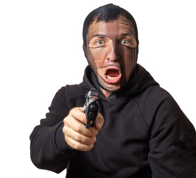 Isolated robber with a stocking on his head and a gun in his hands on a white background