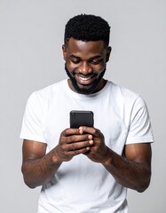 A bearded man in a crisp white shirt stands outdoors, intently gazing at his smartphone, with a thoughtful expression on his face.